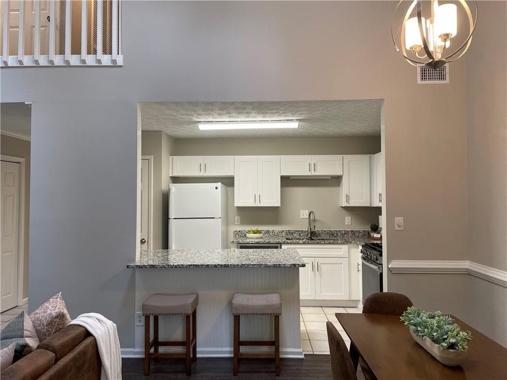 3 bedroom, 2 bathroom, 1,390 sq ft townhouse for rent at 1068 Travelers Trail, Kennesaw, GA 30144 for $2,300 a month — photo 2