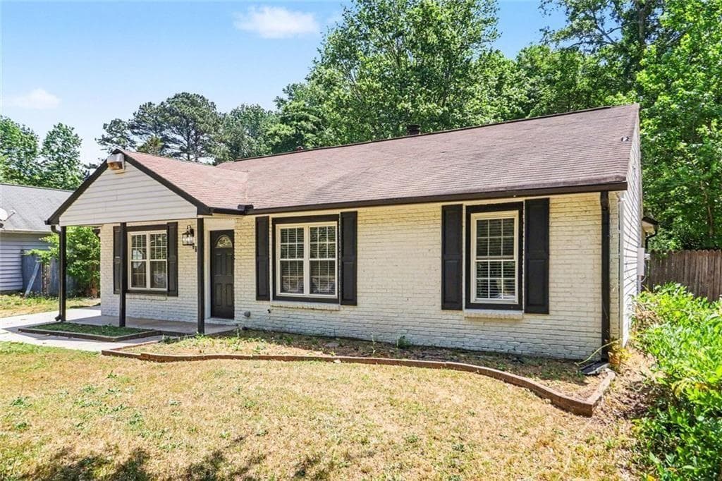 4 bedroom, 2 bathroom, 1,342 sq ft single family residence for sale at 627 Towngate Boulevard, Jonesboro, GA 30238 — photo 3