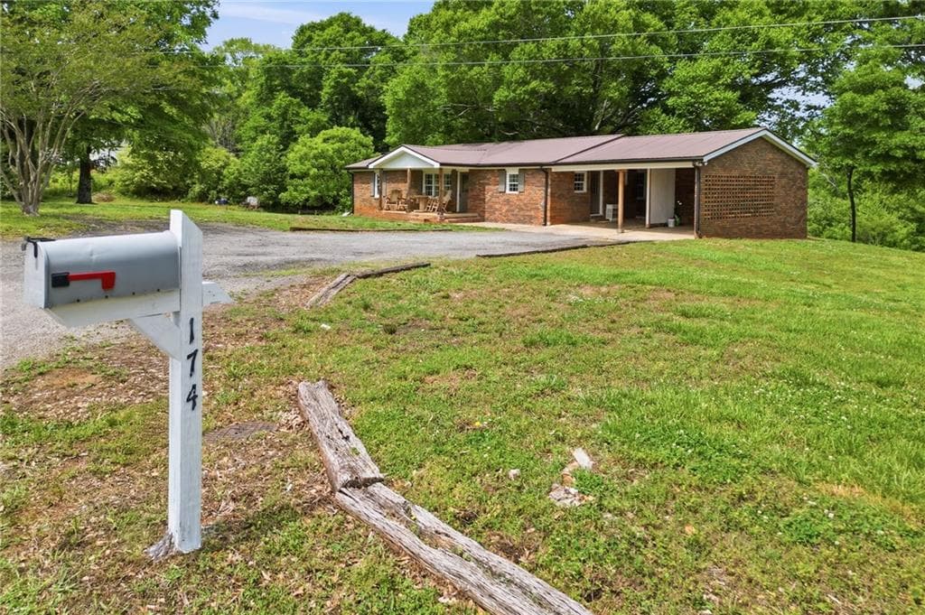 4 bedroom, 2 bathroom, 1,784 sq ft single family residence for sale at 174 Old Ballground Road, Canton, GA 30115 — photo 4