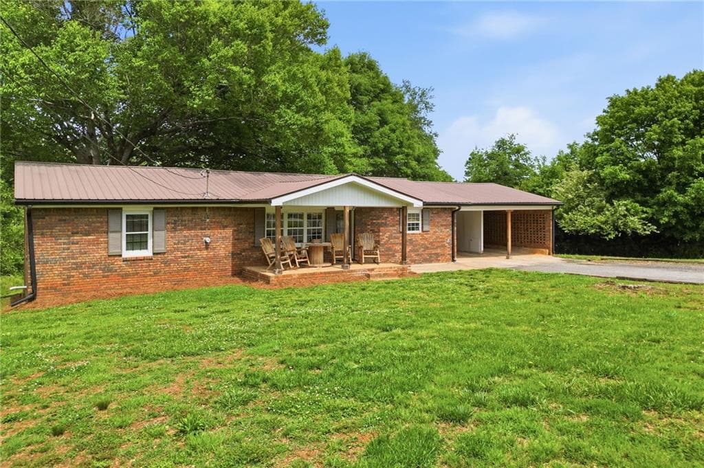4 bedroom, 2 bathroom, 1,784 sq ft single family residence for sale at 174 Old Ballground Road, Canton, GA 30115 — photo 2