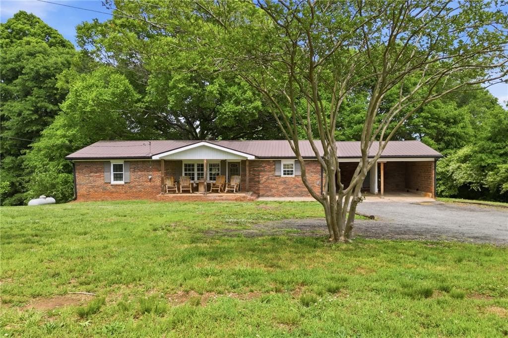 4 bedroom, 2 bathroom, 1,784 sq ft single family residence for sale at 174 Old Ballground Road, Canton, GA 30115 — photo 1 of 44