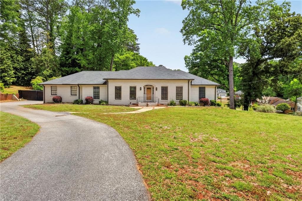 5 bedroom, 3 bathroom, 3,621 sq ft single family residence for sale at 3450 Old Fairburn Road, Atlanta, GA 30331