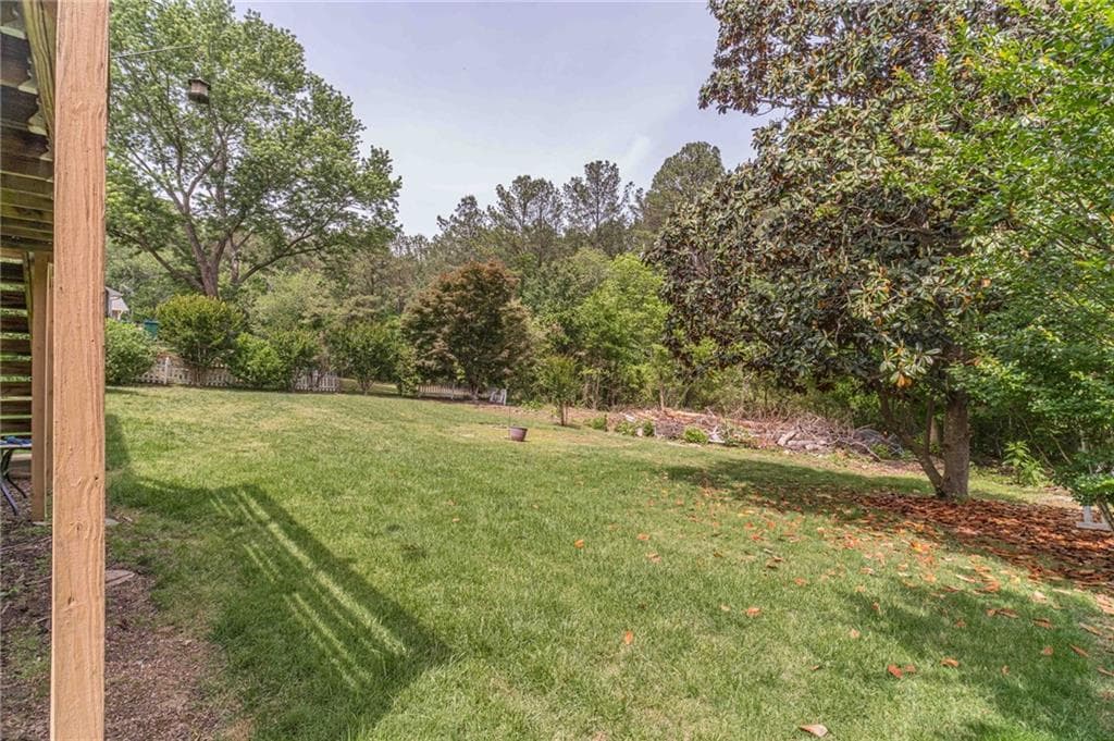 4 bedroom, 3 bathroom, 2,040 sq ft single family residence for sale at 4285 Bending River Trail, Lilburn, GA 30047 — photo 4