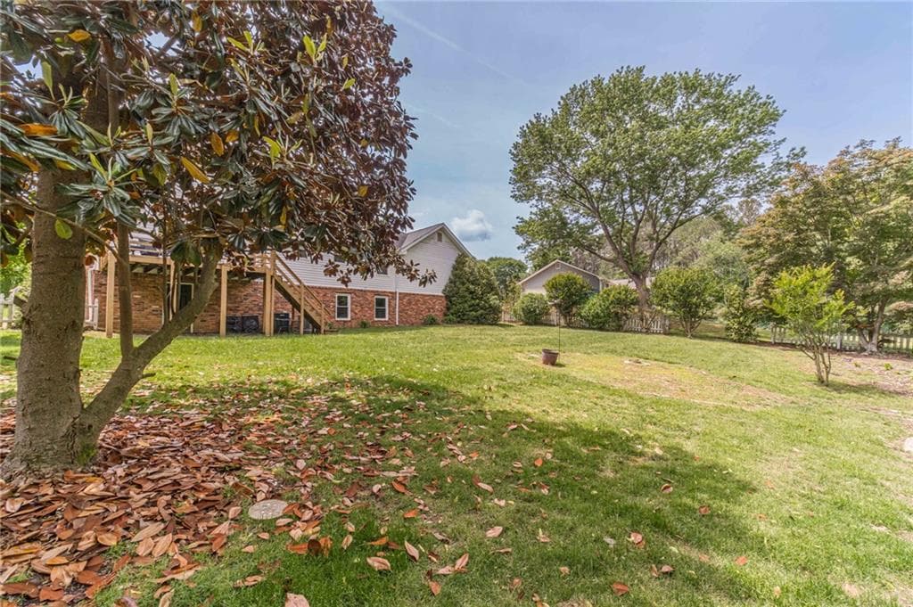 4 bedroom, 3 bathroom, 2,040 sq ft single family residence for sale at 4285 Bending River Trail, Lilburn, GA 30047 — photo 5