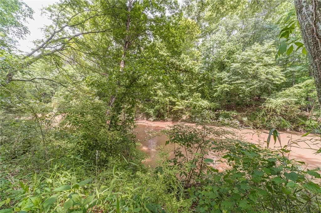 4 bedroom, 3 bathroom, 2,040 sq ft single family residence for sale at 4285 Bending River Trail, Lilburn, GA 30047 — photo 9