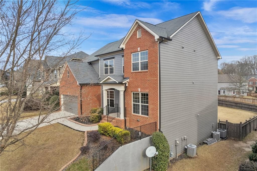 6 bedroom, 6 bathroom, 4,188 sq ft single family residence for sale at 4610 Evandale Way, Cumming, GA 30040 — photo 2