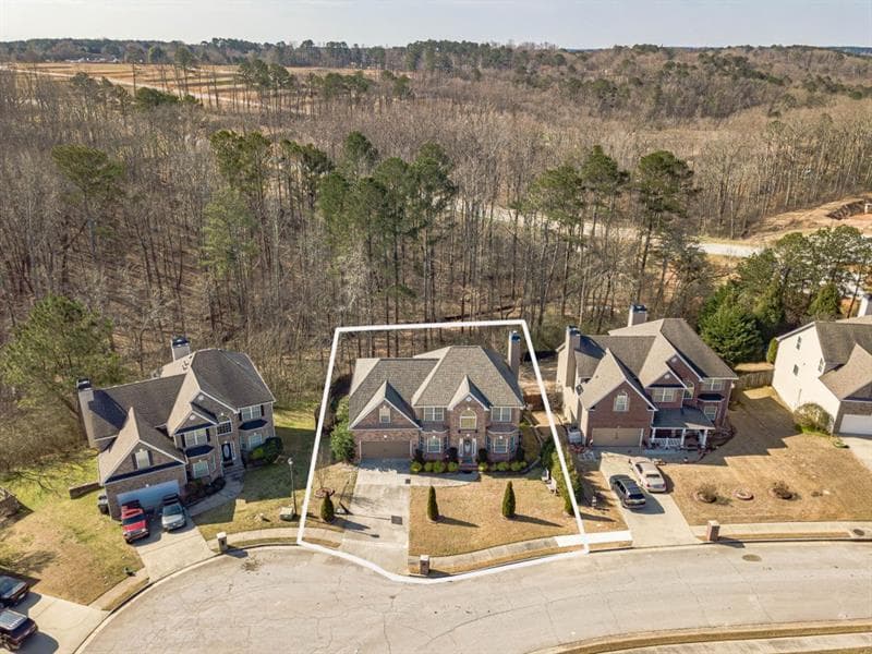 5 bedroom, 4 bathroom, 2,577 sq ft single family residence for sale at 598 Georgia Circle, Loganville, GA 30052 — photo 2