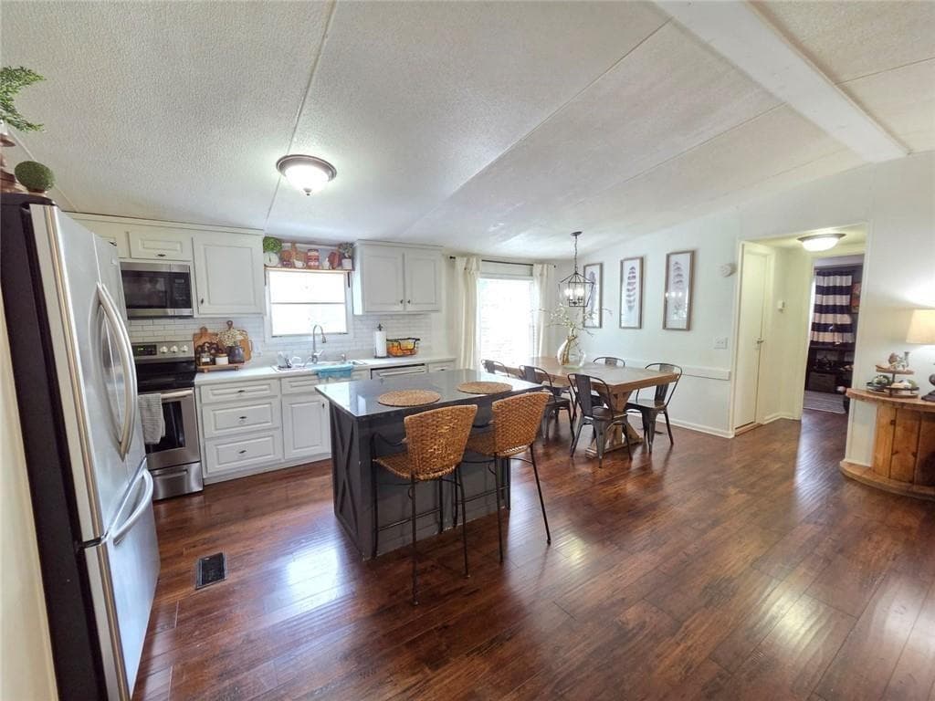 3 bedroom, 2 bathroom, 1,320 sq ft single family residence for sale at 4855 Peachtree Drive, Buford, GA 30518 — photo 8