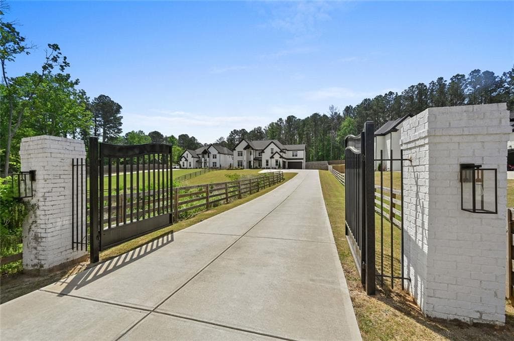 5 bedroom, 6 bathroom, 5,805 sq ft single family residence for sale at 2694 Thompson Mill Road, Buford, GA 30519 — photo 2