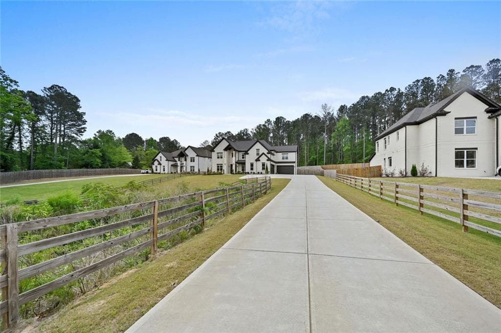 5 bedroom, 6 bathroom, 5,805 sq ft single family residence for sale at 2694 Thompson Mill Road, Buford, GA 30519 — photo 3