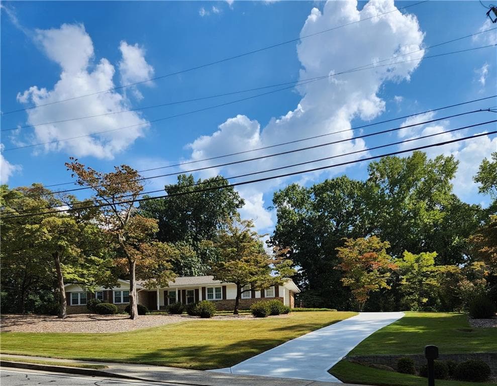4 bedroom, 2 bathroom, 1,822 sq ft single family residence for sale at 1554 COOPER LAKE Road, Smyrna, GA 30082 — photo 2