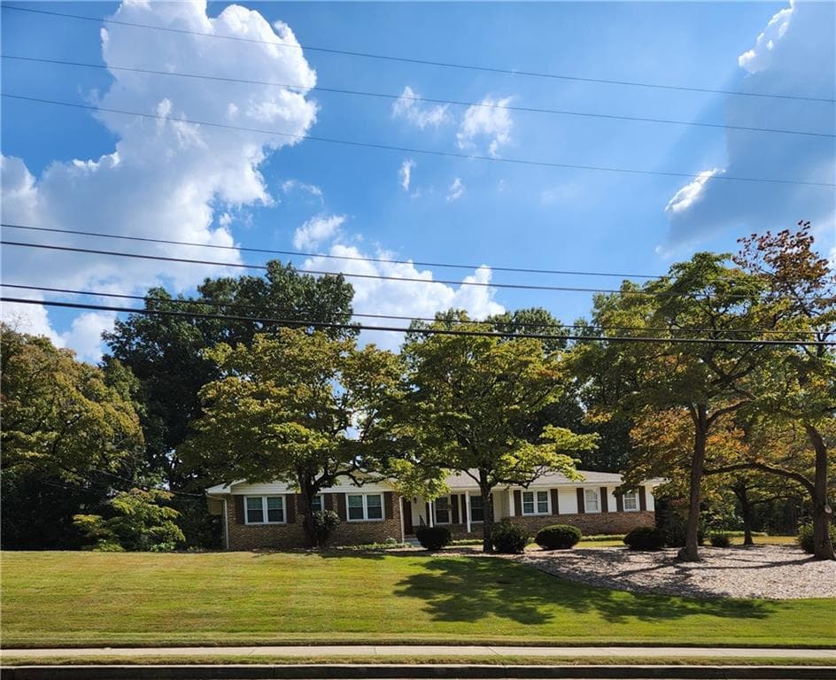 4 bedroom, 2 bathroom, 1,822 sq ft single family residence for sale at 1554 COOPER LAKE Road, Smyrna, GA 30082