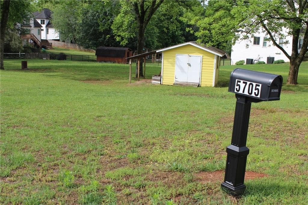 3 bedroom, 1 bathroom, 1,196 sq ft single family residence for sale at 5705 P W A Drive, Cumming, GA 30041