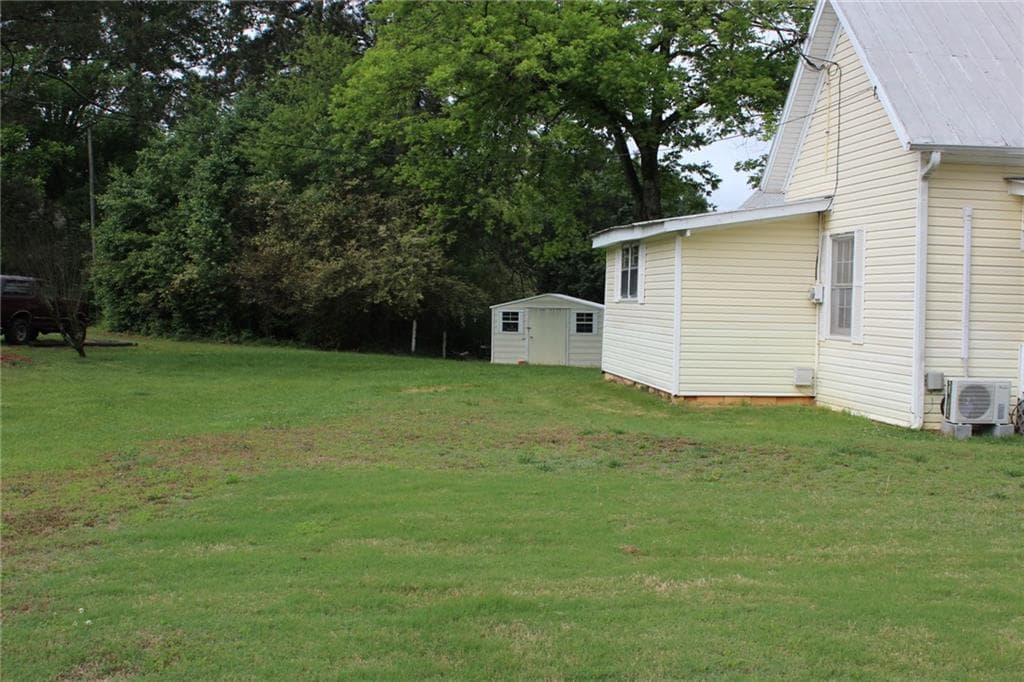 3 bedroom, 1 bathroom, 1,196 sq ft single family residence for sale at 5705 P W A Drive, Cumming, GA 30041 — photo 5