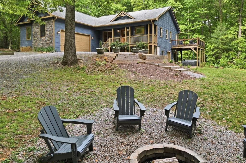 4 bedroom, 3 bathroom, 3,390 sq ft single family residence for sale at 67 Ballard Lane, Ellijay, GA 30536 — photo 1 of 63