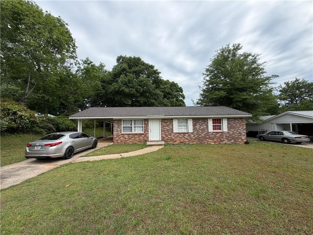 3 bedroom, 2 bathroom, 1,075 sq ft single family residence sold at 6017 Lanier Boulevard, Norcross, GA 30071