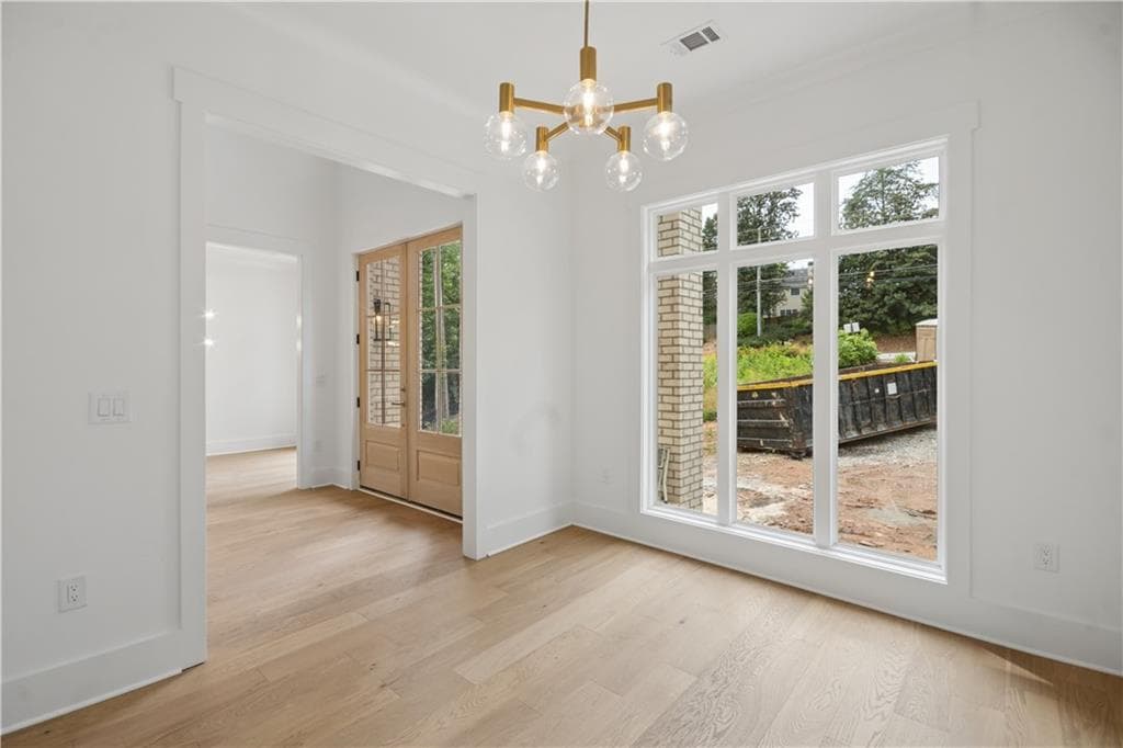 5 bedroom, 4 bathroom, 3,851 sq ft single family residence for sale at 10745 Waters Road, Alpharetta, GA 30022 — photo 5