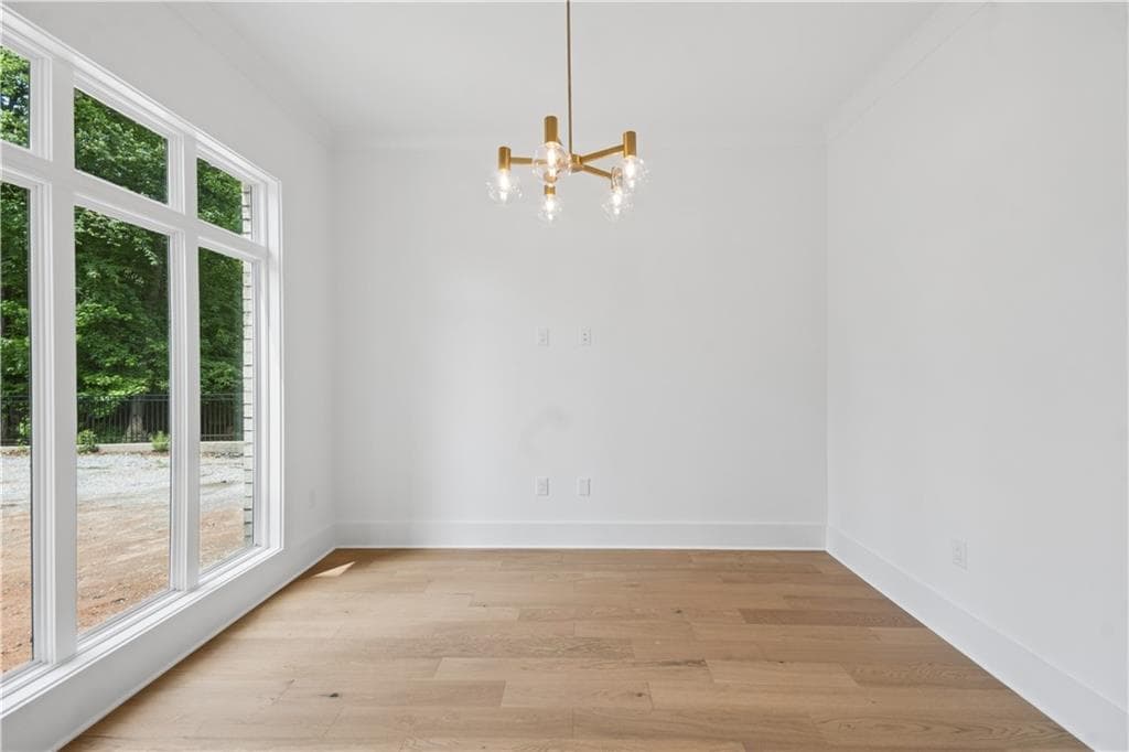 5 bedroom, 4 bathroom, 3,851 sq ft single family residence for sale at 10745 Waters Road, Alpharetta, GA 30022 — photo 6