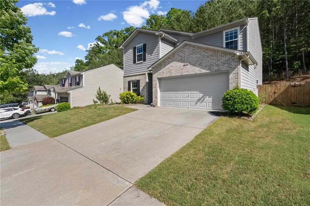 4 bedroom, 3 bathroom, 2,145 sq ft single family residence for sale at 6407 Barker Station Walk, Sugar Hill, GA 30518 — photo 4