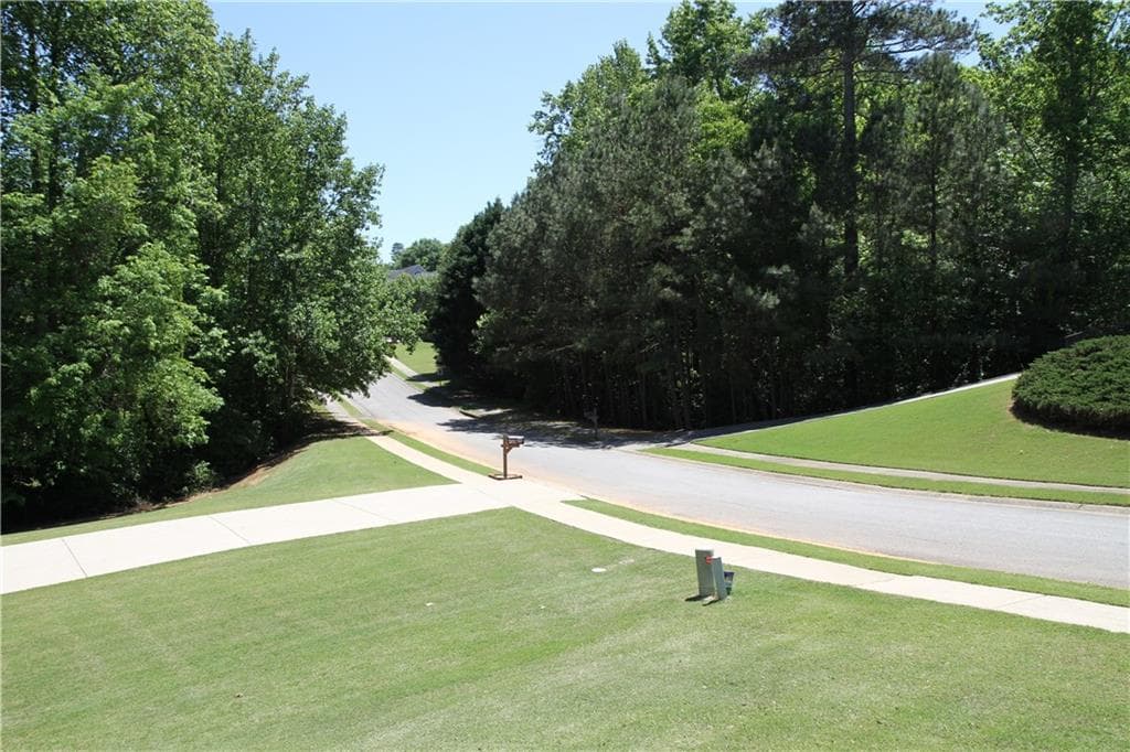 4 bedroom, 3 bathroom, 2,834 sq ft single family residence for sale at 7270 Litany Court, Flowery Branch, GA 30542 — photo 4