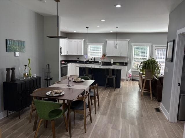 4 bedroom, 3 bathroom, 1,966 sq ft single family residence for sale at 1040 Ada Avenue, Atlanta, GA 30318 — photo 4