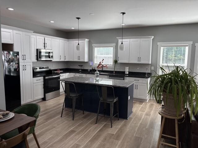 4 bedroom, 3 bathroom, 1,966 sq ft single family residence for sale at 1040 Ada Avenue, Atlanta, GA 30318 — photo 5