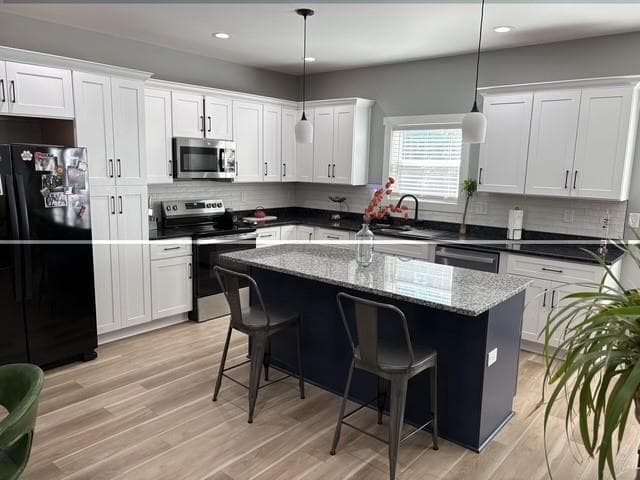 4 bedroom, 3 bathroom, 1,966 sq ft single family residence for sale at 1040 Ada Avenue, Atlanta, GA 30318 — photo 6