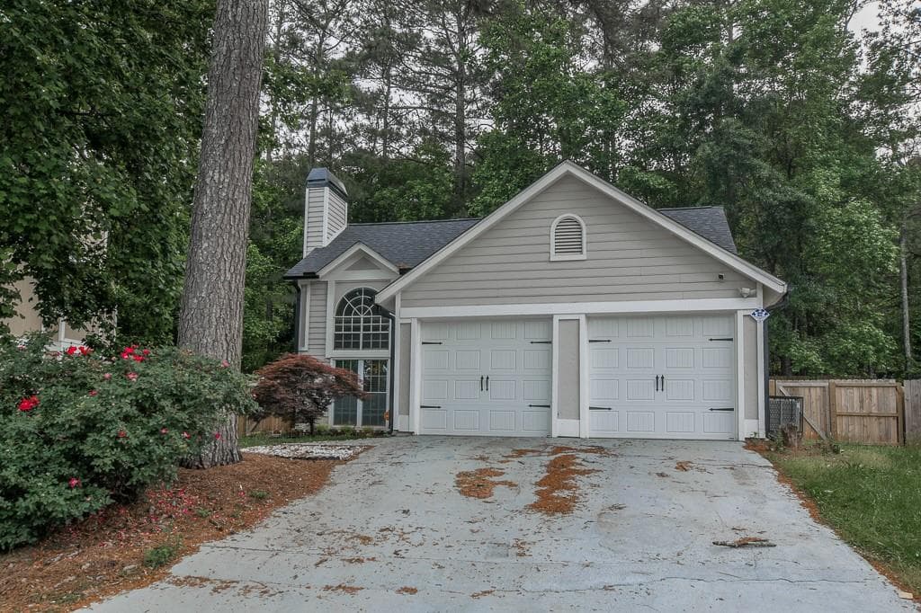 4 bedroom, 2 bathroom, 1,776 sq ft single family residence for sale at 2005 Downs Place, Lithonia, GA 30058 — photo 2
