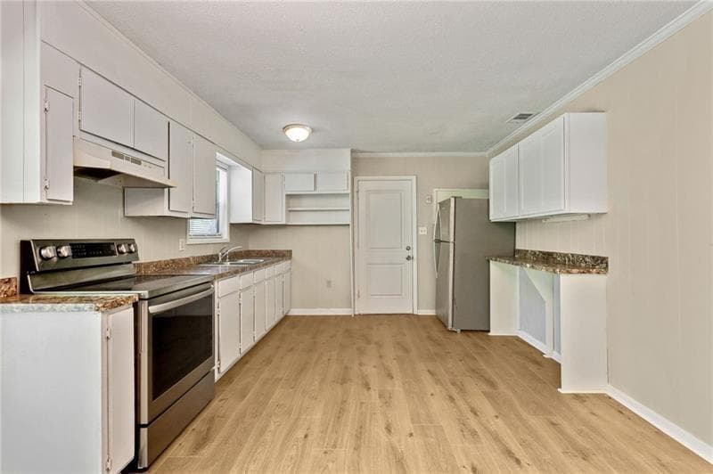 4 bedroom, 2 bathroom, 1,175 sq ft single family residence for sale at 4639 Tell Road, Atlanta, GA 30331 — photo 7