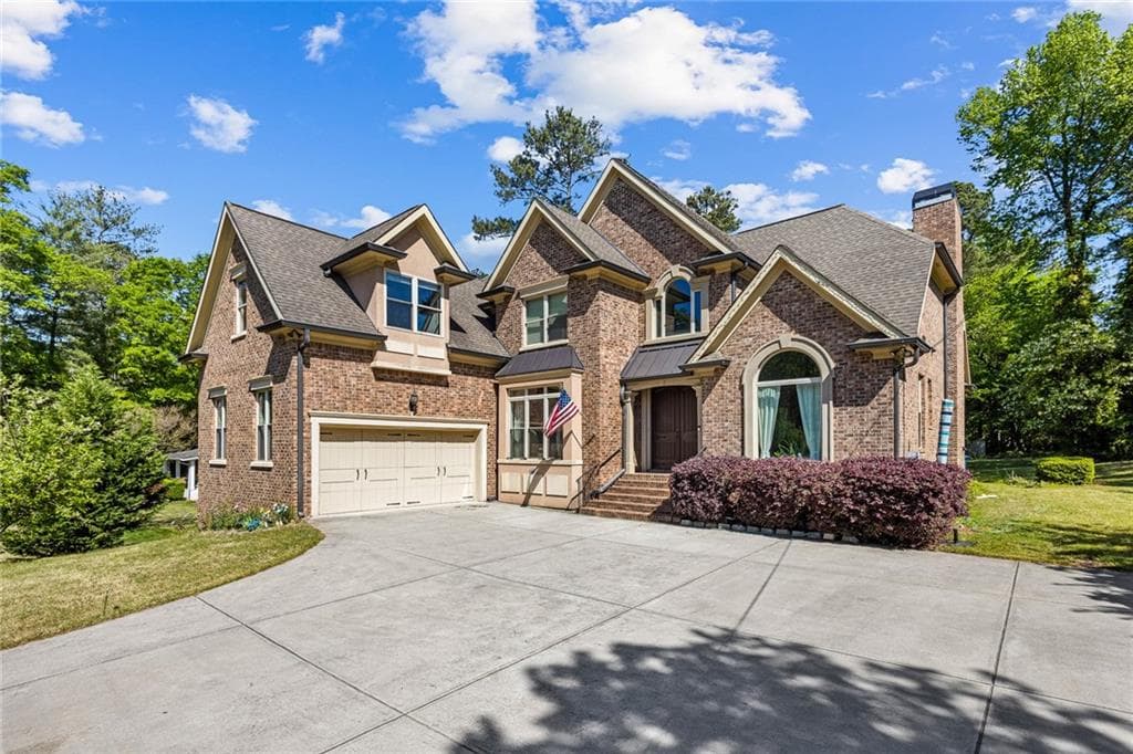 7 bedroom, 6 bathroom, 6,055 sq ft single family residence for sale at 1614 Rucker Road, Alpharetta, GA 30009