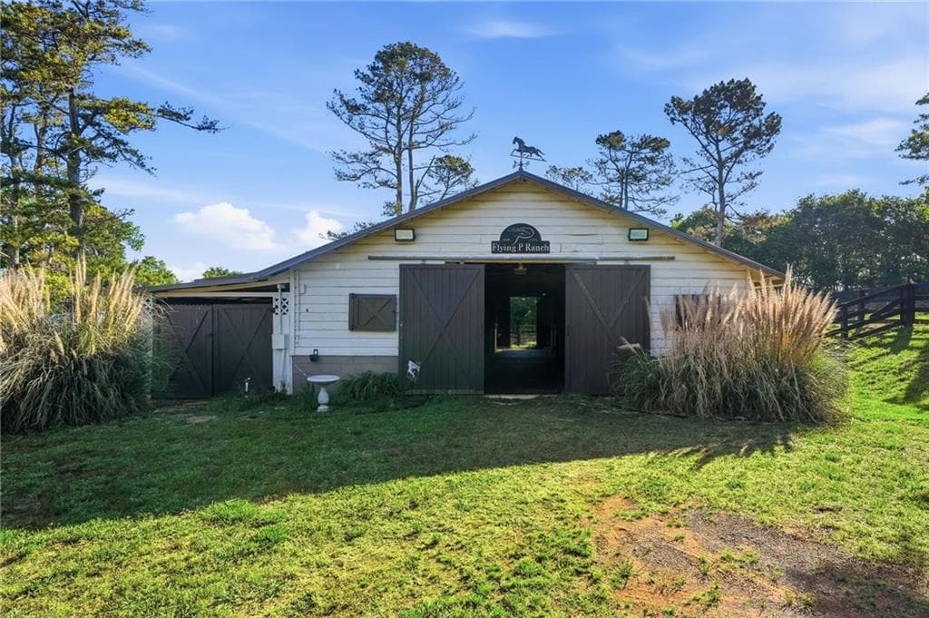 6 bedroom, 5 bathroom, 6,083 sq ft single family residence for sale at 3535 Dr Bramblett Road, Cumming, GA 30028 — photo 8