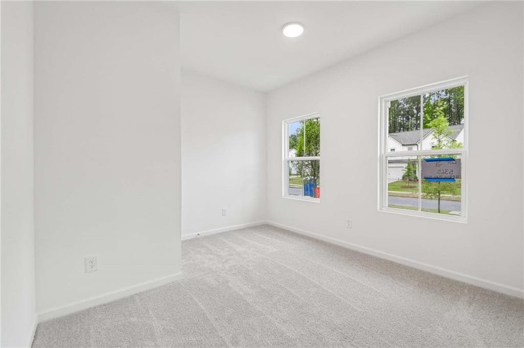 4 bedroom, 3 bathroom, 2,409 sq ft single family residence for sale at 5368 Heron Bay Boulevard, Locust Grove, GA 30248 — photo 4