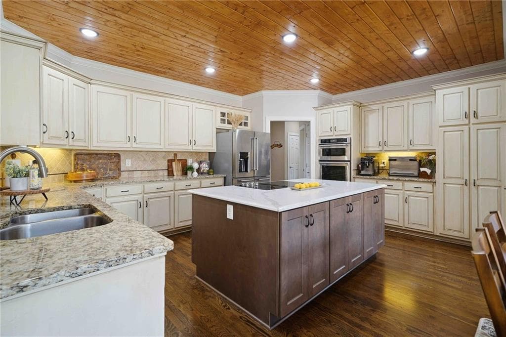 5 bedroom, 4 bathroom, 5,272 sq ft single family residence for sale at 1105 Dapplefawn Court, Alpharetta, GA 30005 — photo 9