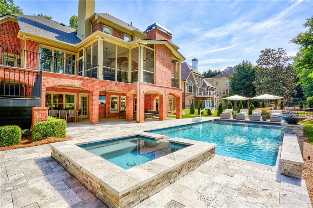 6 bedroom, 5 bathroom, 6,154 sq ft single family residence sold at 7415 Laurel Oak Drive, Suwanee, GA 30024