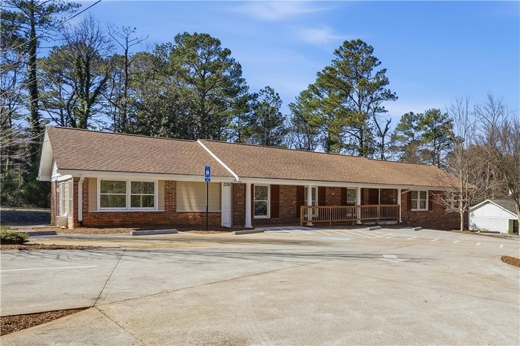4 bedroom, 3 bathroom, 2,200 sq ft single family residence for sale at 2239 Scenic Drive, Snellville, GA 30078 — photo 2