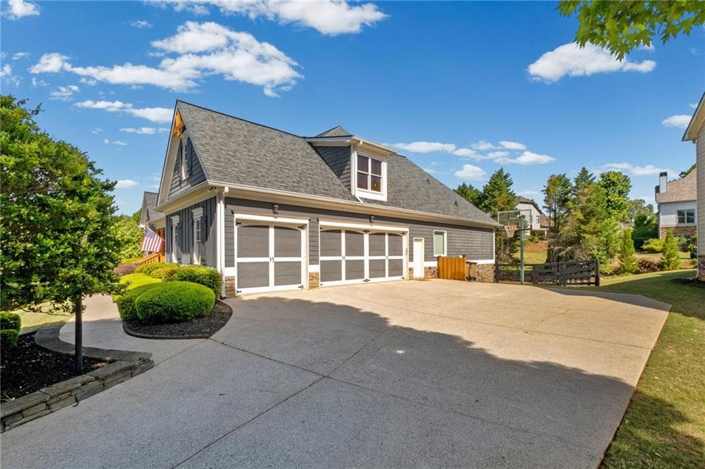 6 bedroom, 4 bathroom, 4,422 sq ft single family residence for sale at 8670 Gilmer Fort, Ball Ground, GA 30107 — photo 4