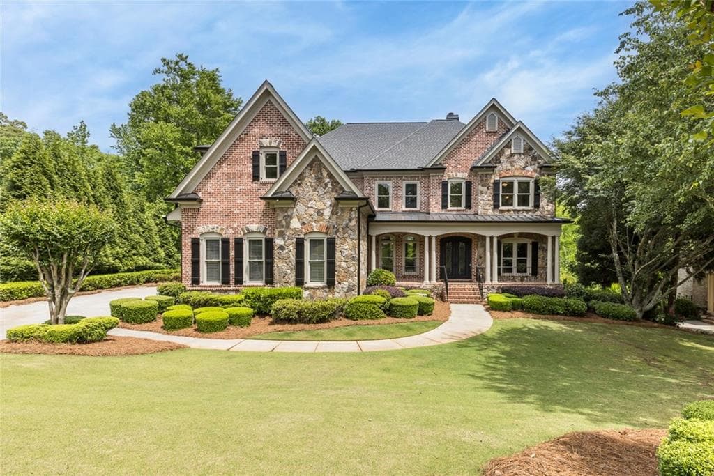 6 bedroom, 6 bathroom, 7,511 sq ft single family residence sold at 8740 Islesworth Court, Duluth, GA 30097