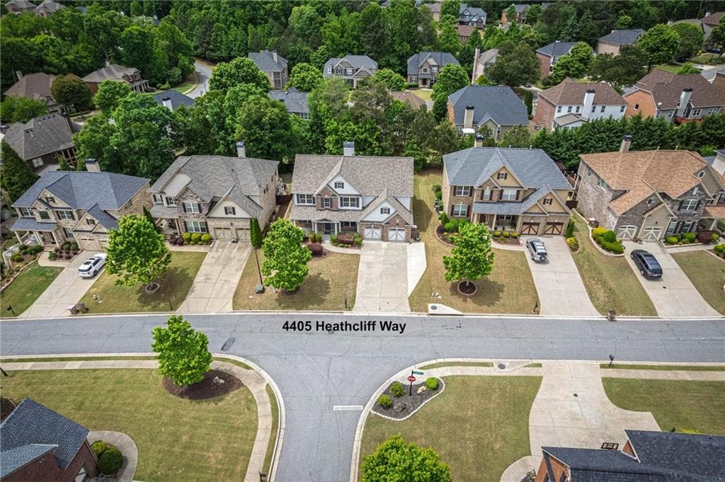 5 bedroom, 4 bathroom, 2,738 sq ft single family residence for sale at 4405 Heathcliff Way, Cumming, GA 30041 — photo 3