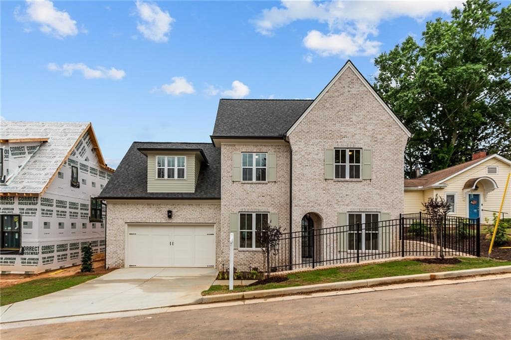 6 bedroom, 6 bathroom, 4,879 sq ft single family residence for sale at 29 E Park Street, Buford, GA 30518