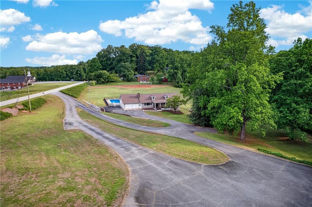 5 bedroom, 3 bathroom, 8,096 sq ft single family residence for sale at 165 Porter Springs Road, Dahlonega, GA 30533