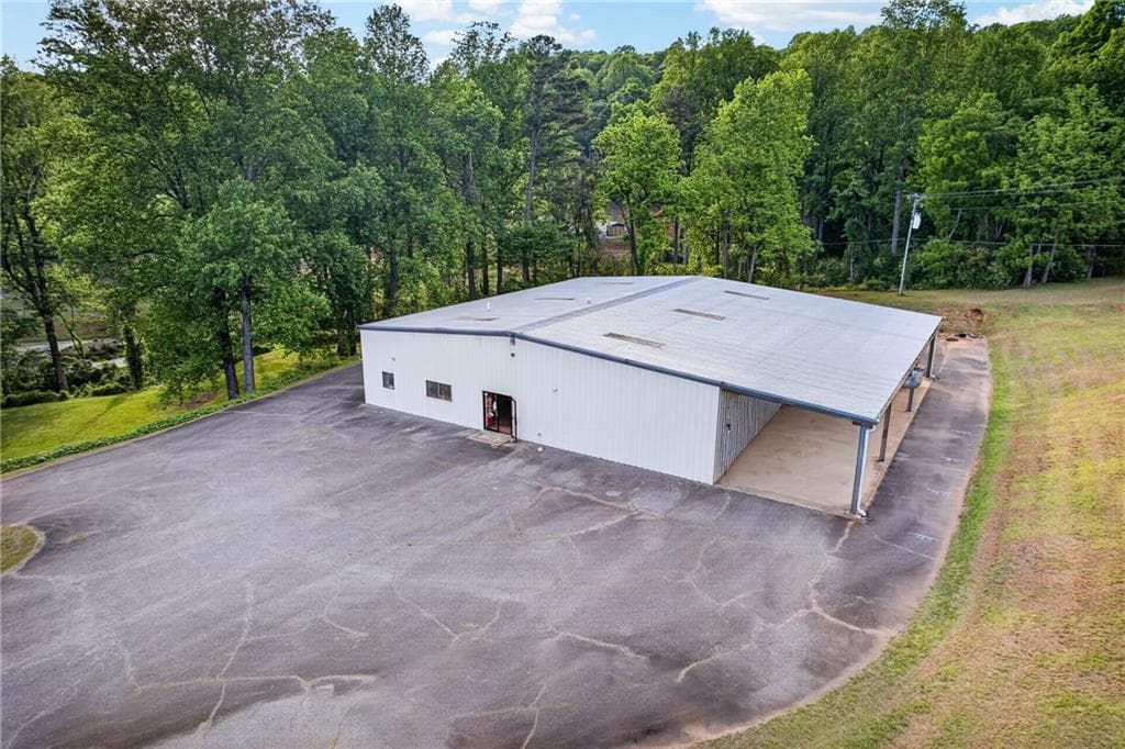 5 bedroom, 3 bathroom, 8,096 sq ft single family residence for sale at 165 Porter Springs Road, Dahlonega, GA 30533 — photo 2