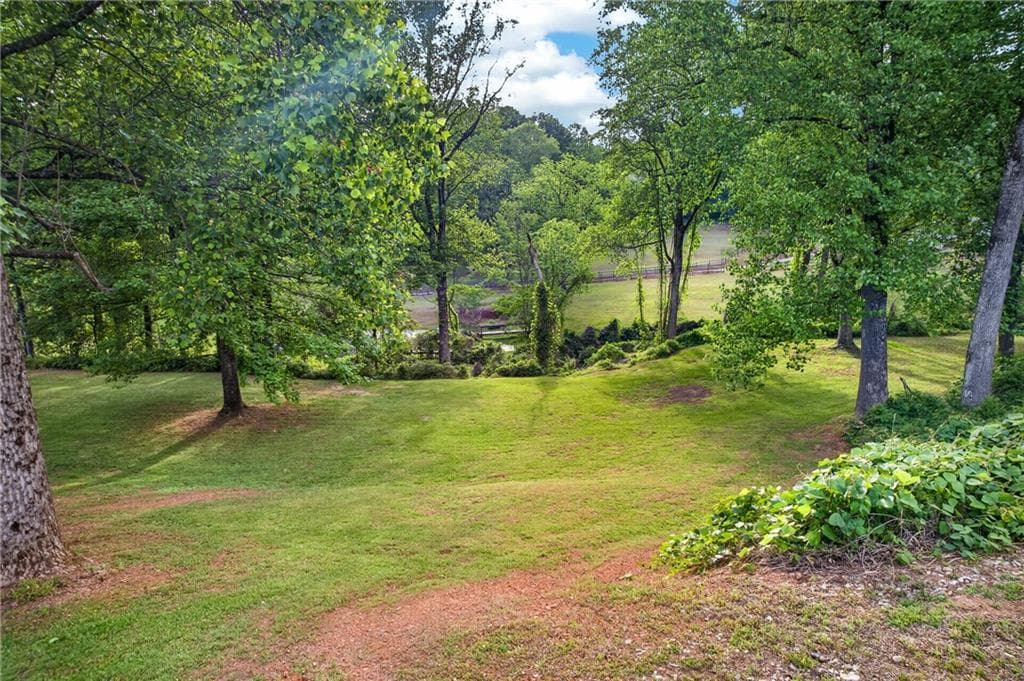 5 bedroom, 3 bathroom, 8,096 sq ft single family residence for sale at 165 Porter Springs Road, Dahlonega, GA 30533 — photo 4