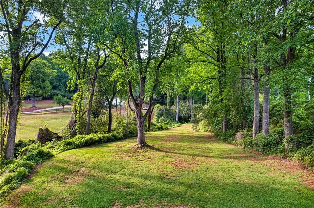 5 bedroom, 3 bathroom, 8,096 sq ft single family residence for sale at 165 Porter Springs Road, Dahlonega, GA 30533 — photo 5