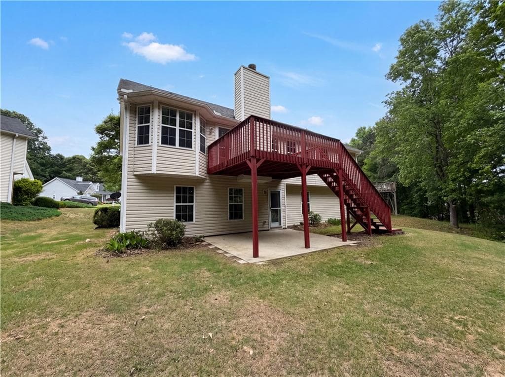 5 bedroom, 3 bathroom, 3,245 sq ft single family residence for sale at 3222 Keenly Ives Court, Buford, GA 30519 — photo 5