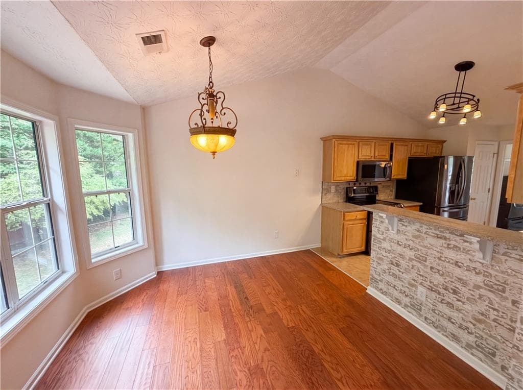 5 bedroom, 3 bathroom, 3,245 sq ft single family residence for sale at 3222 Keenly Ives Court, Buford, GA 30519 — photo 7
