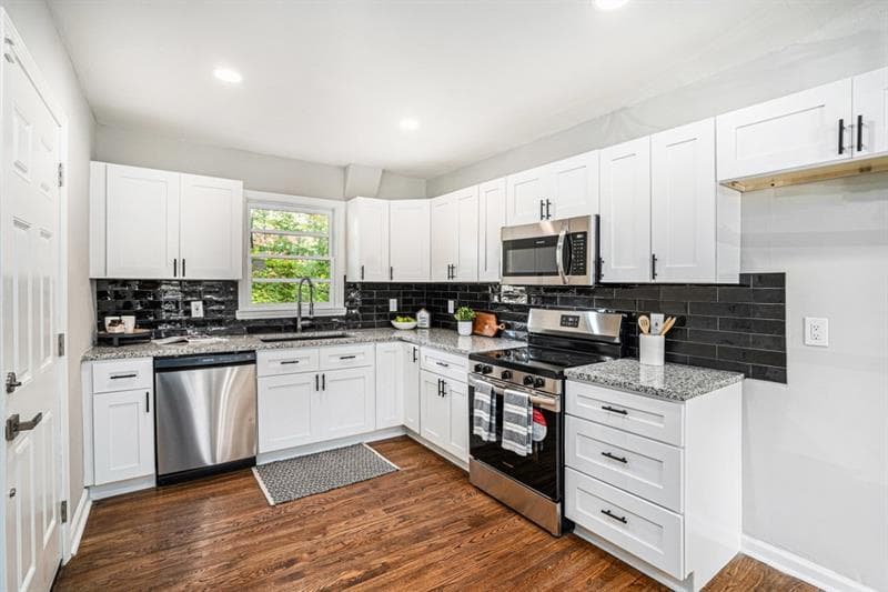 4 bedroom, 2 bathroom, 1,728 sq ft single family residence for sale at 2693 Washington Street, Atlanta, GA 30318 — photo 3