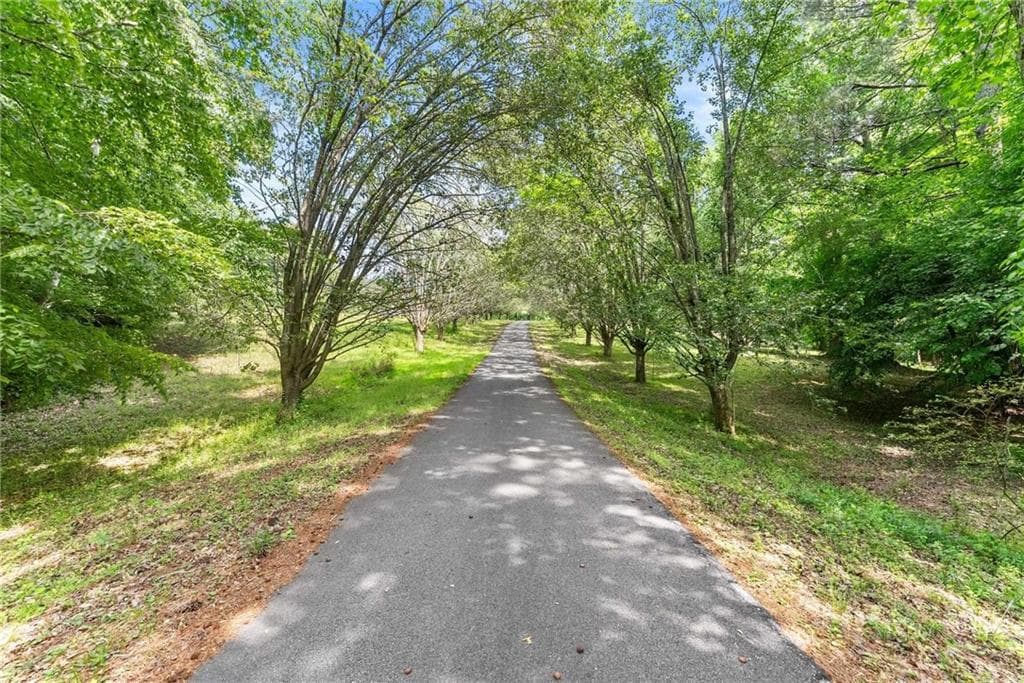 5 bedroom, 4 bathroom, 3,906 sq ft single family residence for sale at 5141 Strickland Road, Gainesville, GA 30507 — photo 2
