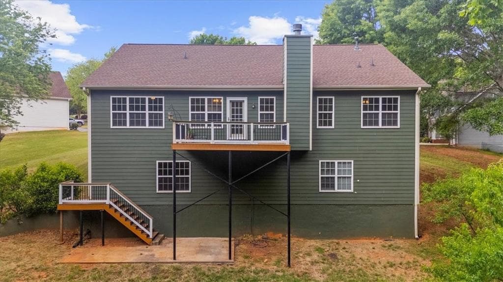 5 bedroom, 3 bathroom, 4,014 sq ft single family residence for sale at 8780 Amberfield Drive, Gainesville, GA 30506 — photo 7