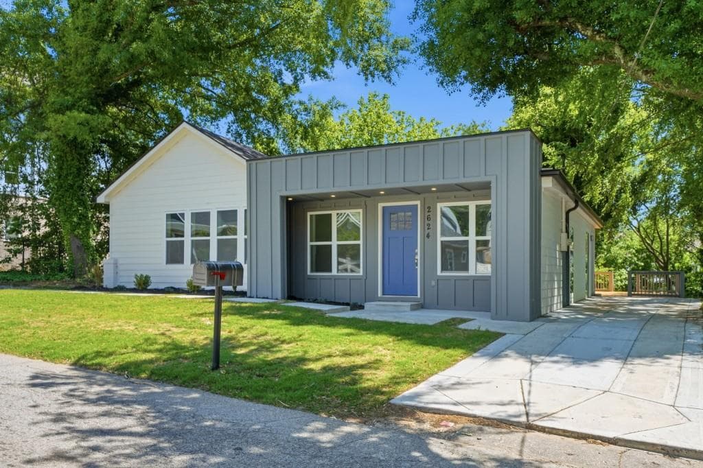 4 bedroom, 3 bathroom, 2,352 sq ft single family residence for sale at 2624 Peyton Road, Atlanta, GA 30318 — photo 1 of 42