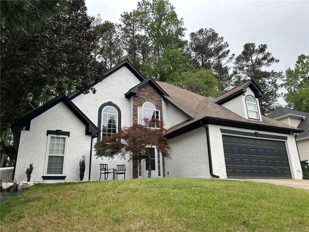 3 bedroom, 3 bathroom, 2,090 sq ft single family residence for sale at 2657 Mcguire Drive, Kennesaw, GA 30144 — photo 1 of 21